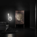 Mobile tondo di design ambientato con illuminazione decorativa