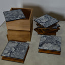 sottobicchieri in specchio di design con finitura decorativa