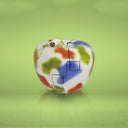 Alt: Salvadanaio decorativo a forma di mela con decorazione filo continuo