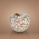 Salvadanaio a forma di mela con riccioli decorativi in metallo prezioso