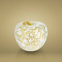 Dettaglio riccioli decorativi mela luxury in metallo prezioso